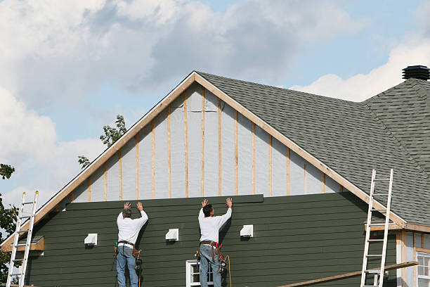 Professional Siding technician working in Young America, MN